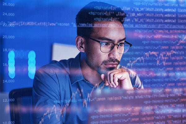 man looking at computer man looking at computer